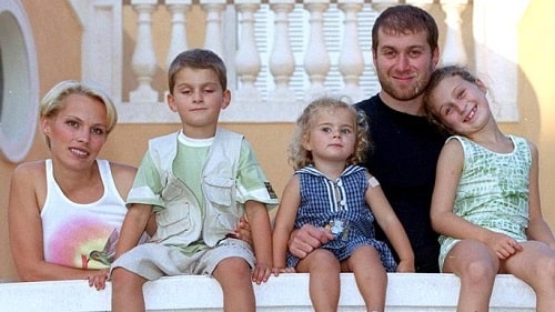 A picture of Arkadiy with two of his siblings and parents.